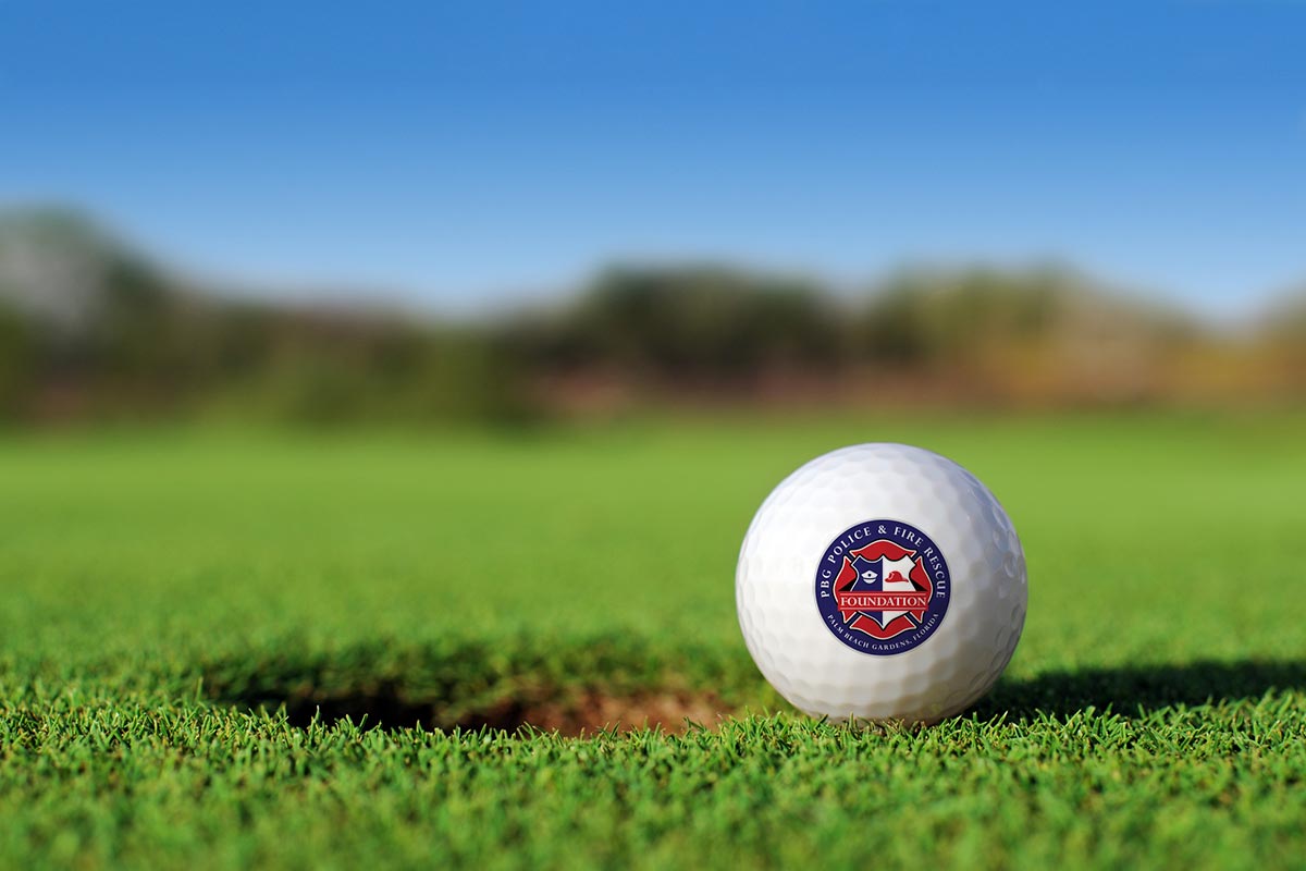 Golf Ball next to Hole